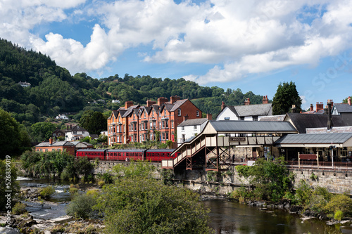 Llangollen, Wales, 27 August, 2022: Old railway station museum and beautiful town of Llangollen, Wales, UK during nice summer day photo