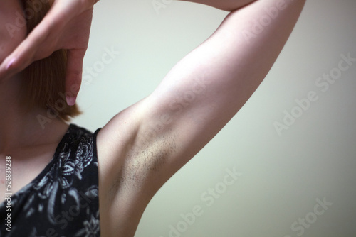 forearm with natural bristles, female hand, body positive