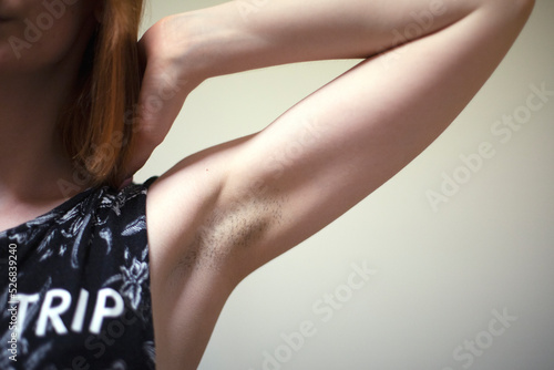 forearm with natural bristles, female hand, body positive