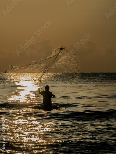 Sunrise on the beach of Palmeres (Valencia-Spain) photo