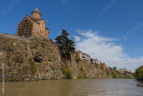 A view of the ancient Metekhi Church, built on the banks of the Mtkvari River in Tbilisi. Georgia country photo