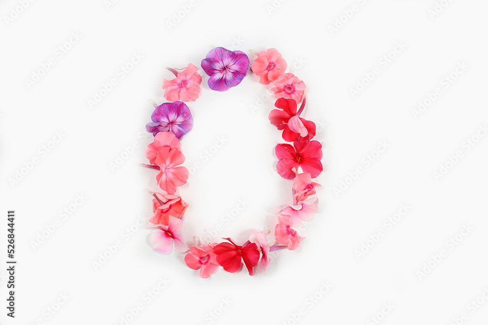Letter O made from real fresh flowers. Floral font concept. Unique collection of letters and numbers for design. Spring, summer, autumn and valentines, creative idea, selective focus