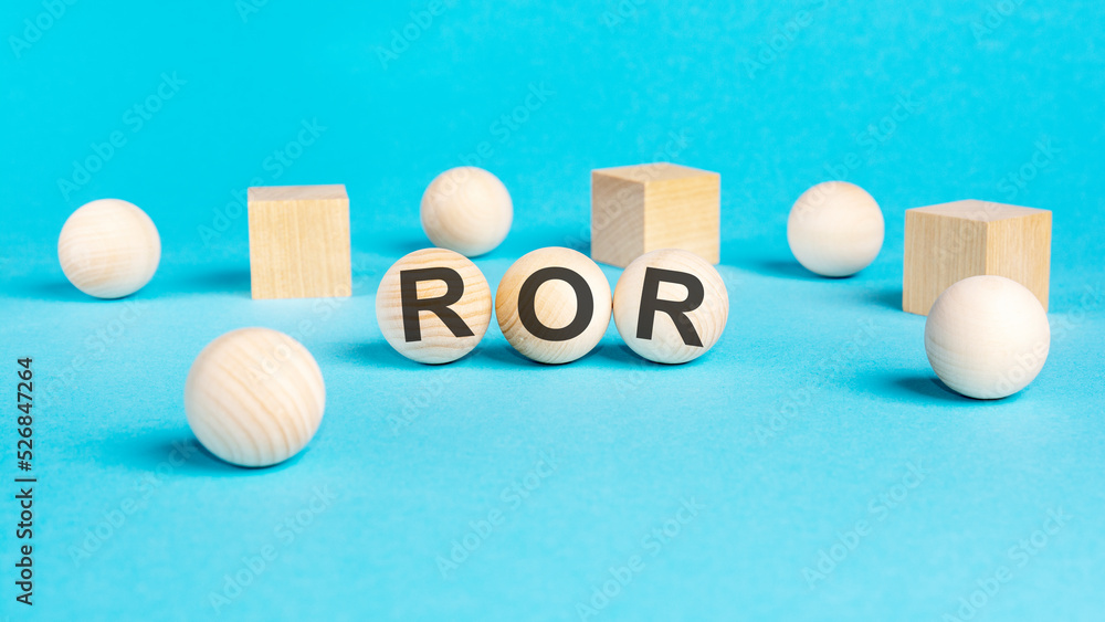 acronym ror on wooden balls, bright blue background