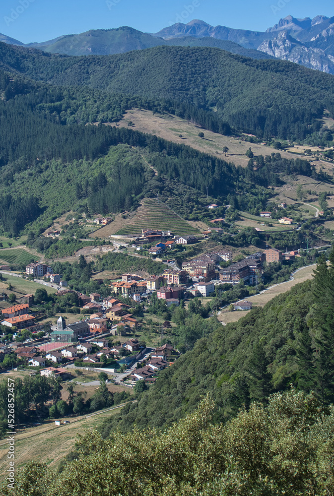 Panoramic views of the town of Potes from Mount Arabades on a sunny day, Picos de Europa Natural Park, Cantabria, Spain