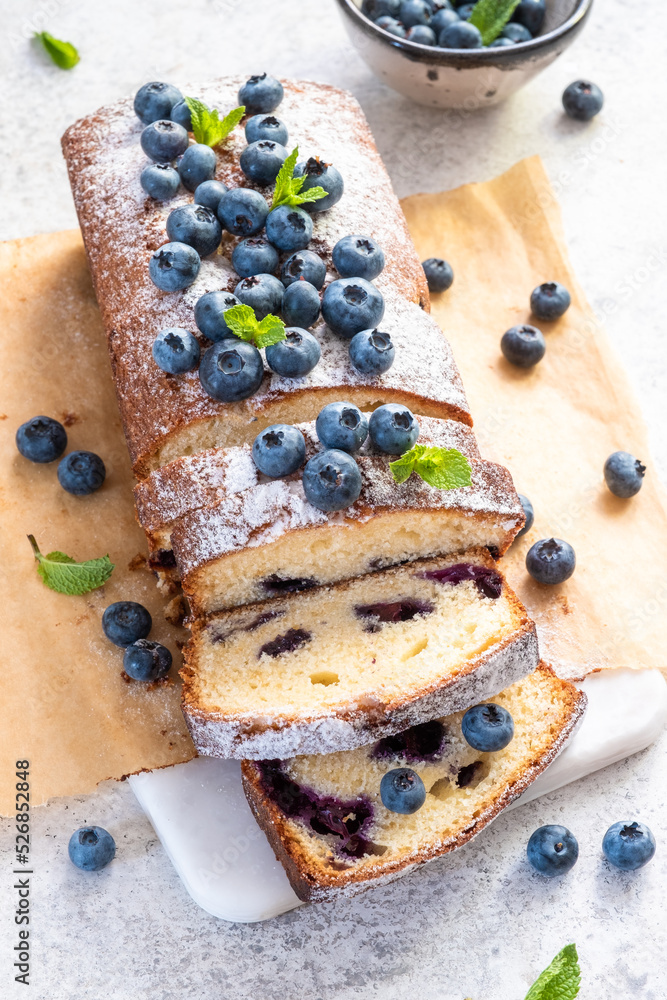 fresh blueberry loaf of bread muffin cake with mint closeup on a table fresh blueberry loaf of bread muffin cake with mint closeup on a table