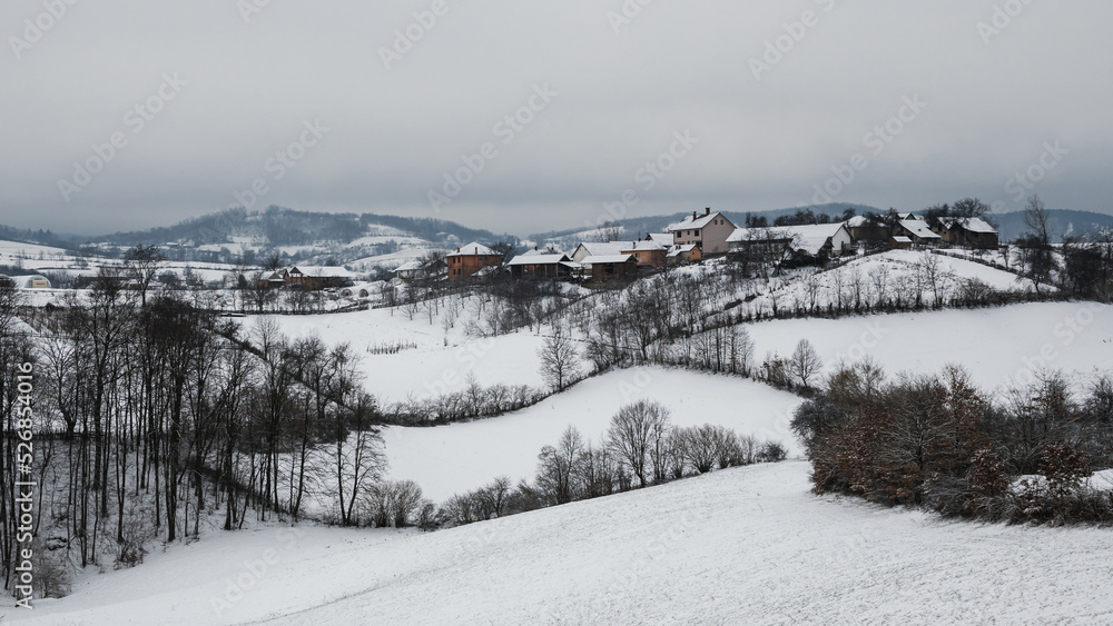 A village on a hill covered with snow in western Serbia A village on a hill covered with snow in western Serbia