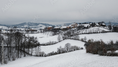 A village on a hill covered with snow in western Serbia