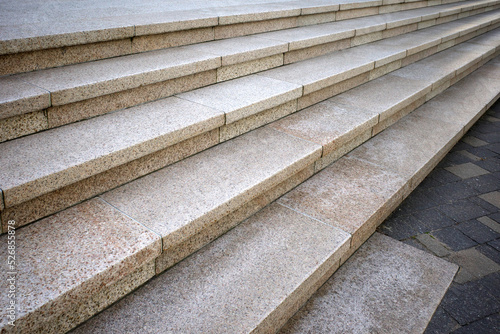 Close-up on a granite staircase in perspective. Selective focus.