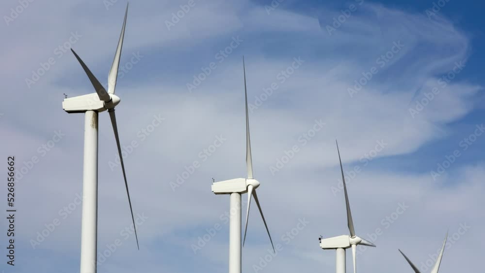 Cinemagraph of wind turbines with blue cloudy sky
Cinemagraph of wind turbines with blue cloudy sky