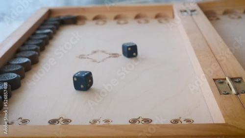 backgammon game dice roll and move photo