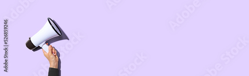 Photos Attention and announcement concept with person holding a megaphone