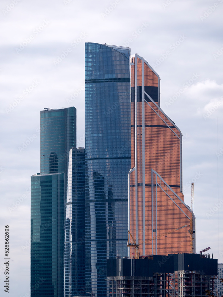 Modern buildings of glass and steel skyscrapers against the sky