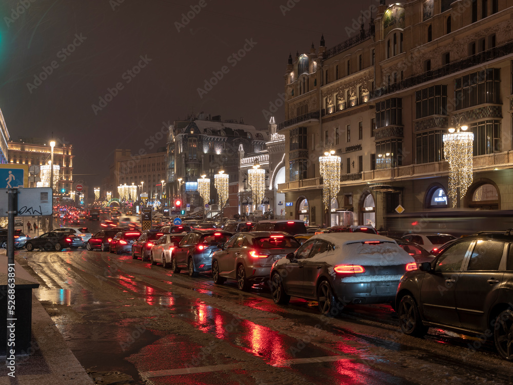 MOSCOW, RUSSIA - JANUARY 27, 2022: Urban traffic life conceptnear near to the big theater