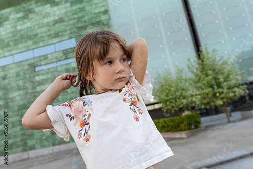 Wallpaper Mural Portrait of a little girl outside in summer at glass building Torontodigital.ca