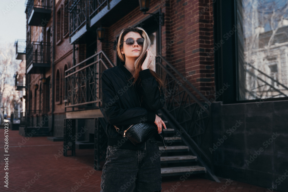 young girl with glasses on the street of the old town young girl with glasses on the street of the old town