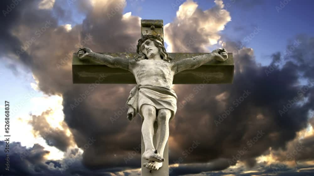 Cinemagraph of stone cross with Jesus and cloudy sky
Cinemagraph of stone cross with Jesus and cloudy sky