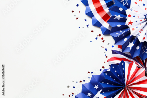 Happy Labor Day, Independence Day, Presidents Day banner design. Flat lay paper fans decorations and confetti on white background.