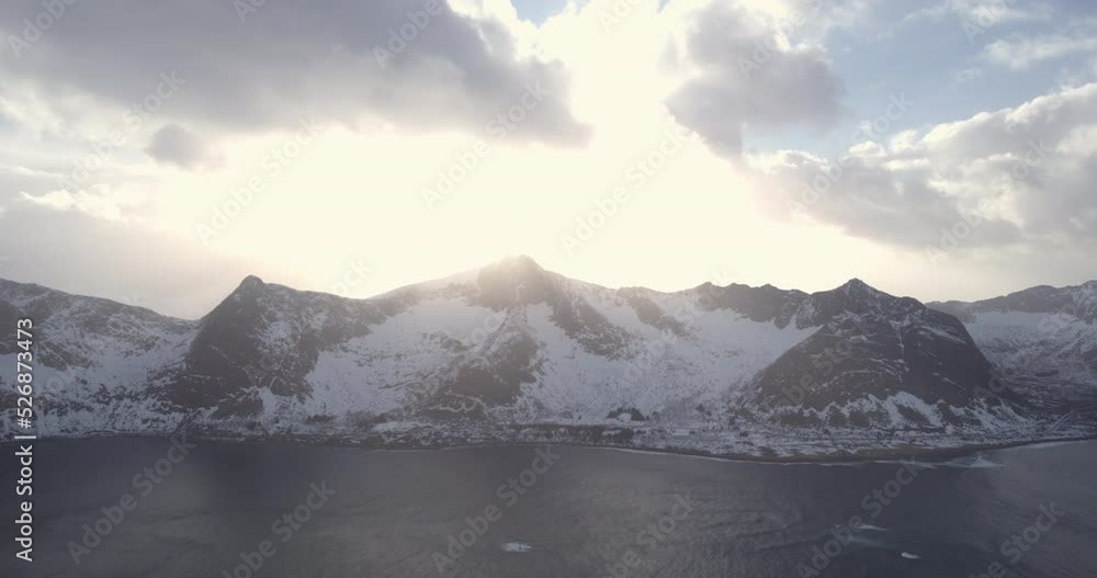 Snow covered mountains on the coastline of norway lofoten Snow covered mountains on the coastline of norway lofoten