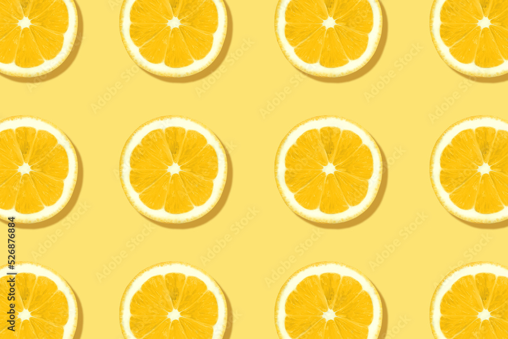 Fresh lemons texture. Summer pattern made with yellow citrus fruits