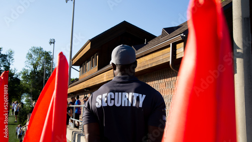 Security guard patrolling soccer stadium