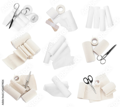 Set with gauze and elastic bandages on white background, top view photo