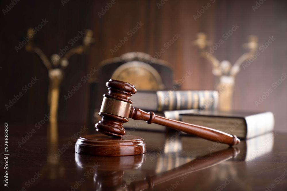 Law theme - judge office. Gavel, legal books and Themis on the judge desk. Law theme - judge office. Gavel, legal books and Themis on the judge desk.