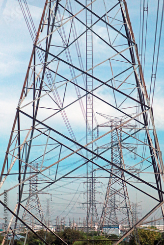 Detail of the the electrical steel tower  on blue sky