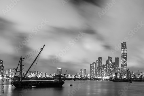 Skyline of Victoria Harbor of Hong Kong city at night © leeyiutung