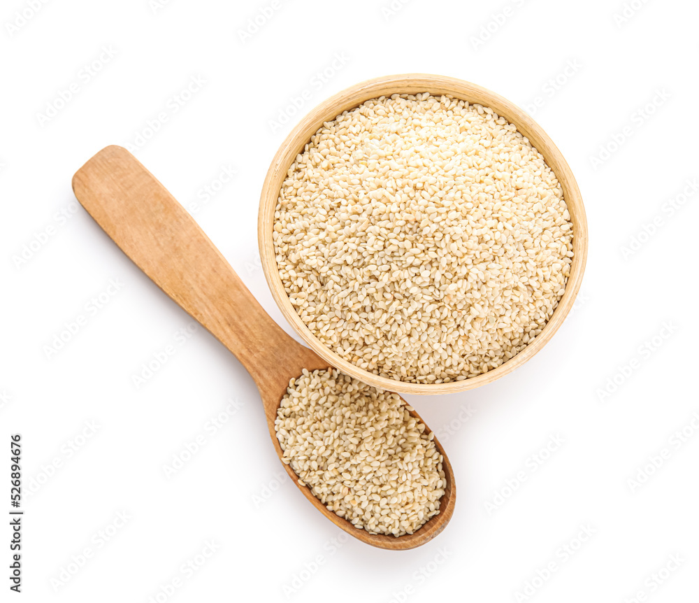 Bowl and spoon with sesame seeds on white background Bowl and spoon with sesame seeds on white background
