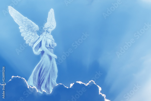 Beautiful angel in heaven on cloud