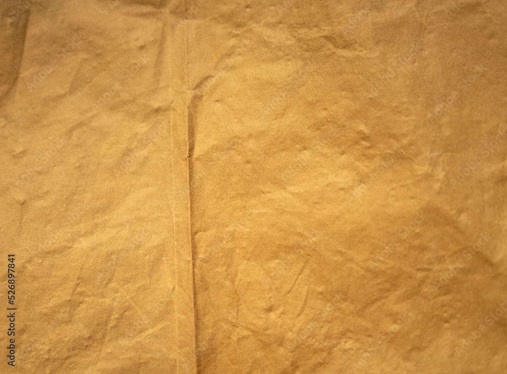 Fototapeta premium golden old paper with torn and crumpled texture for background