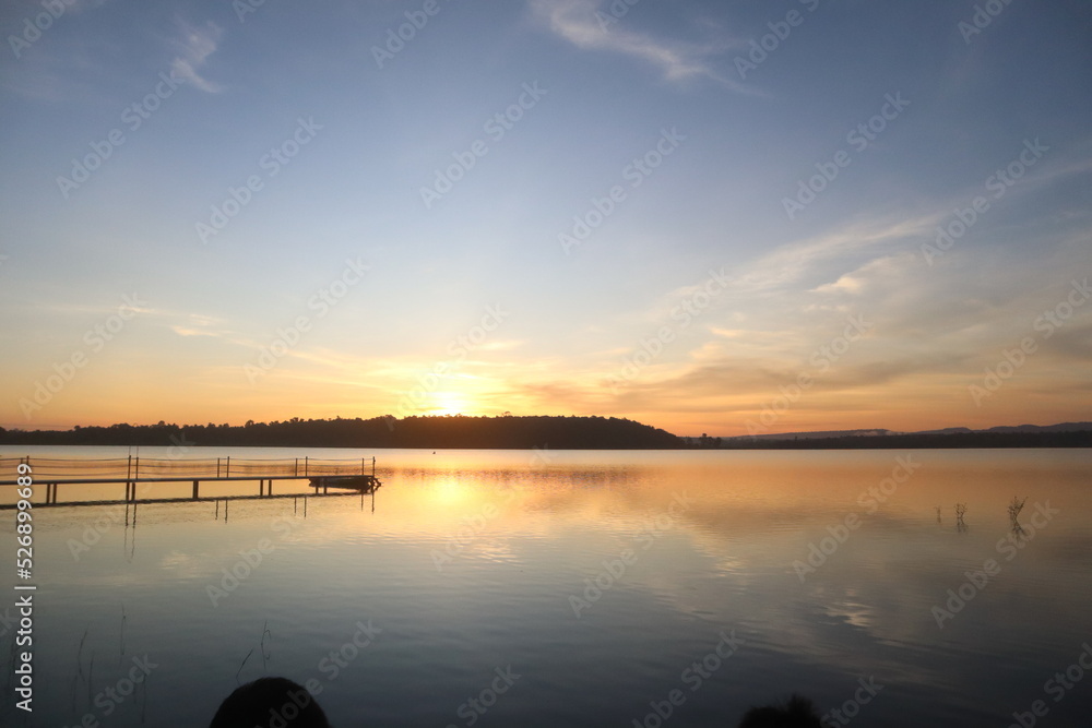 Obraz premium sunset over the river