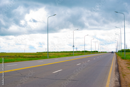 perspective of paved road and sky before rain © Vyacheslav