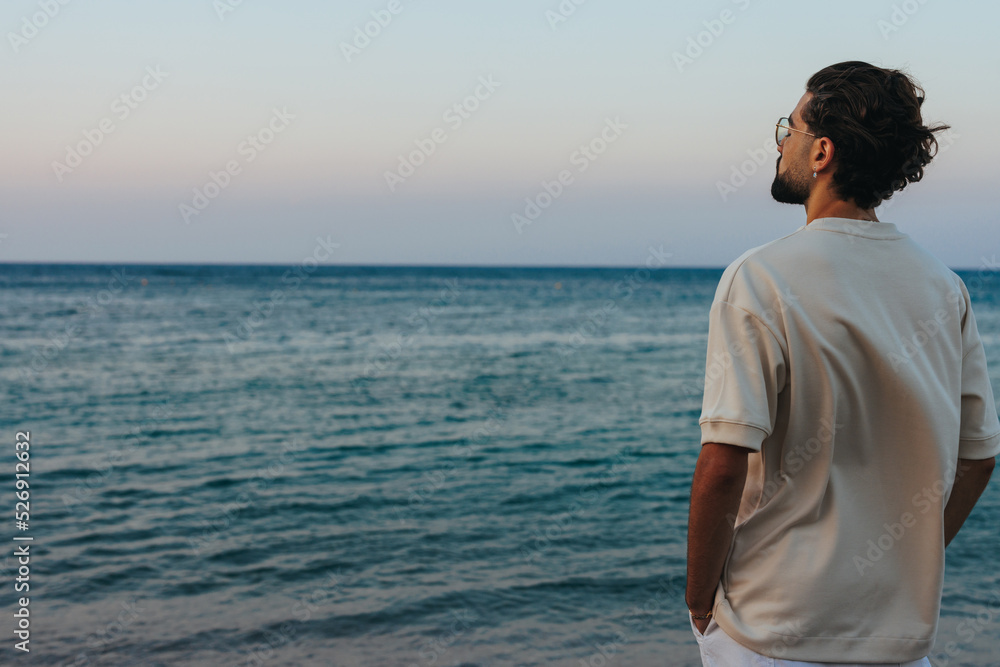 Young man looking at sea.