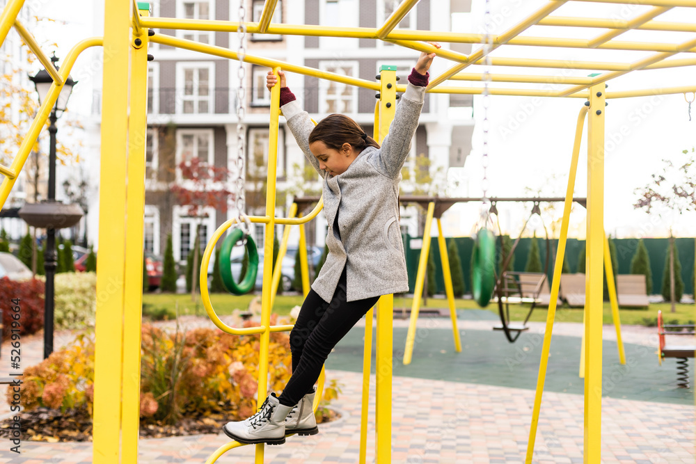 portrait of a little schoolgirl girl at the playground portrait of a little schoolgirl girl at the playground