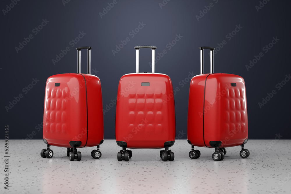 Close-up of luxurious and elegant red suitcases on a gray background. Travel vacation vacation concept. 3d illustration Close-up of luxurious and elegant red suitcases on a gray background. Travel vacation vacation concept. 3d illustration
