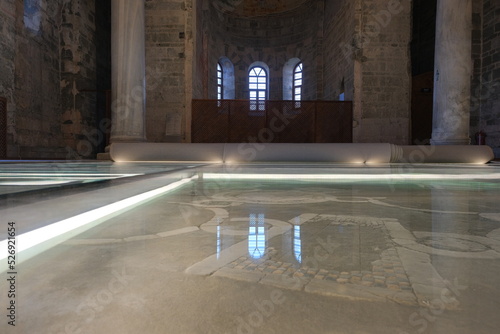 12.31.2022. Trabzon. Turkey. Inside the hagia sophia mosque, reflection of windows on glass ground in Trabzon. photo