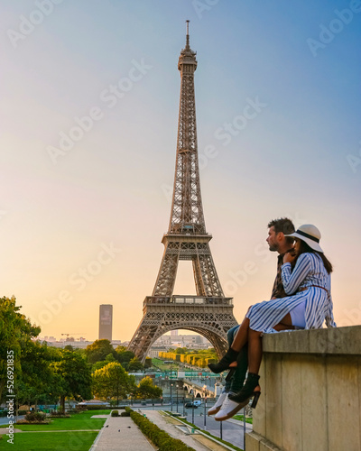 Canvas Print Eiffel tower at Sunrise in Paris France, a Young couple in a city trip by Eiffel