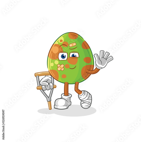 dinosaur egg sick with limping stick. cartoon mascot vector