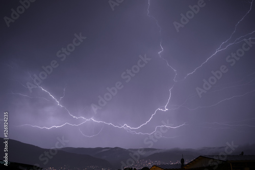 lightning in the night sky, Huge lightning during rainy day in Bursa over grand mountain local name is uludag photo