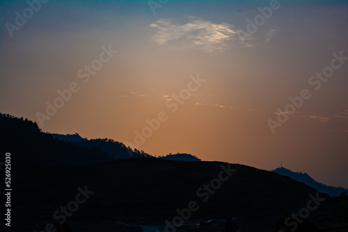 Sunrise view of Tehri mountains. Scenery sunrise over Tehri Lake  Uttarakhand. Tehri Dam  the tallest dam in India and Tehri dam is Asia s largest man-made lake.