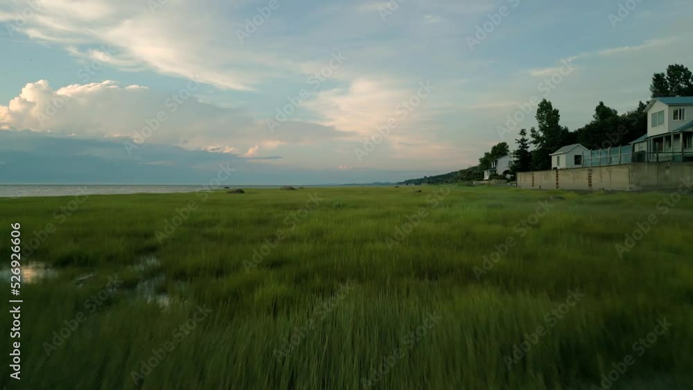 4K Cinematic nature footage of a drone flying over the Saint Lawrence