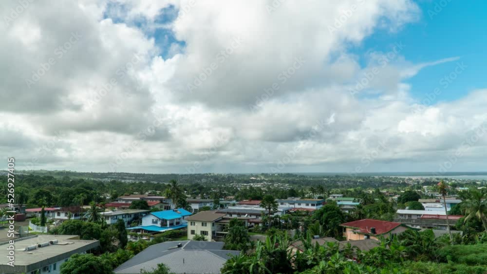 Clouds rolling over residential suburban area of Suva, capital of Fiji, timelapse Clouds rolling over residential suburban area of Suva, capital of Fiji, timelapse