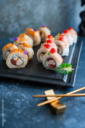 Sushi roll on black board