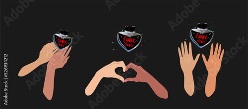 Love elixir in a heart-shaped bottle with a black liquid.  Hands holding the elixir.Magic love.Valentine day