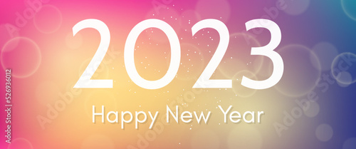 Happy new year 2023 incription on blurred background
