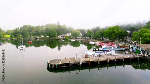 Waterhead Boating Pier At Ambleside, Lake Windermere On A Misty Summer Morning Drone Footage photo