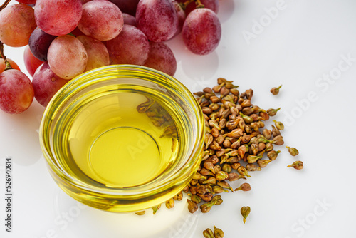 grape seed essential oil on a white background