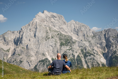 Couple enjoy the view of Slovenian mountains © mooseshop