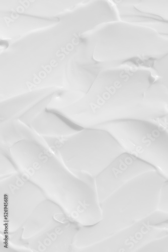 The texture of the white cream. Cosmetic background. Cosmetic product for body care. Wellness and beauty concept.